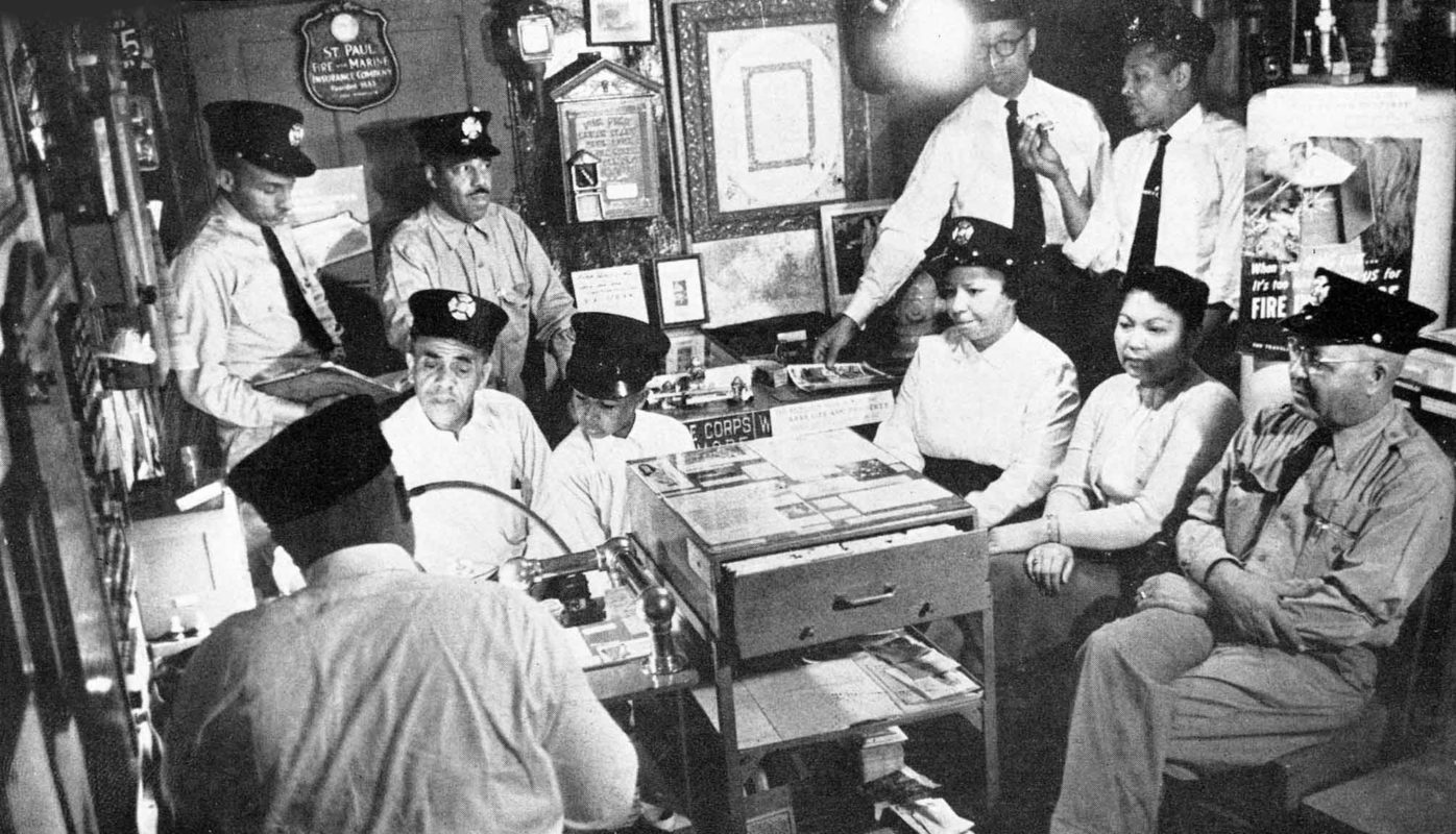 Group of firefighters in the office